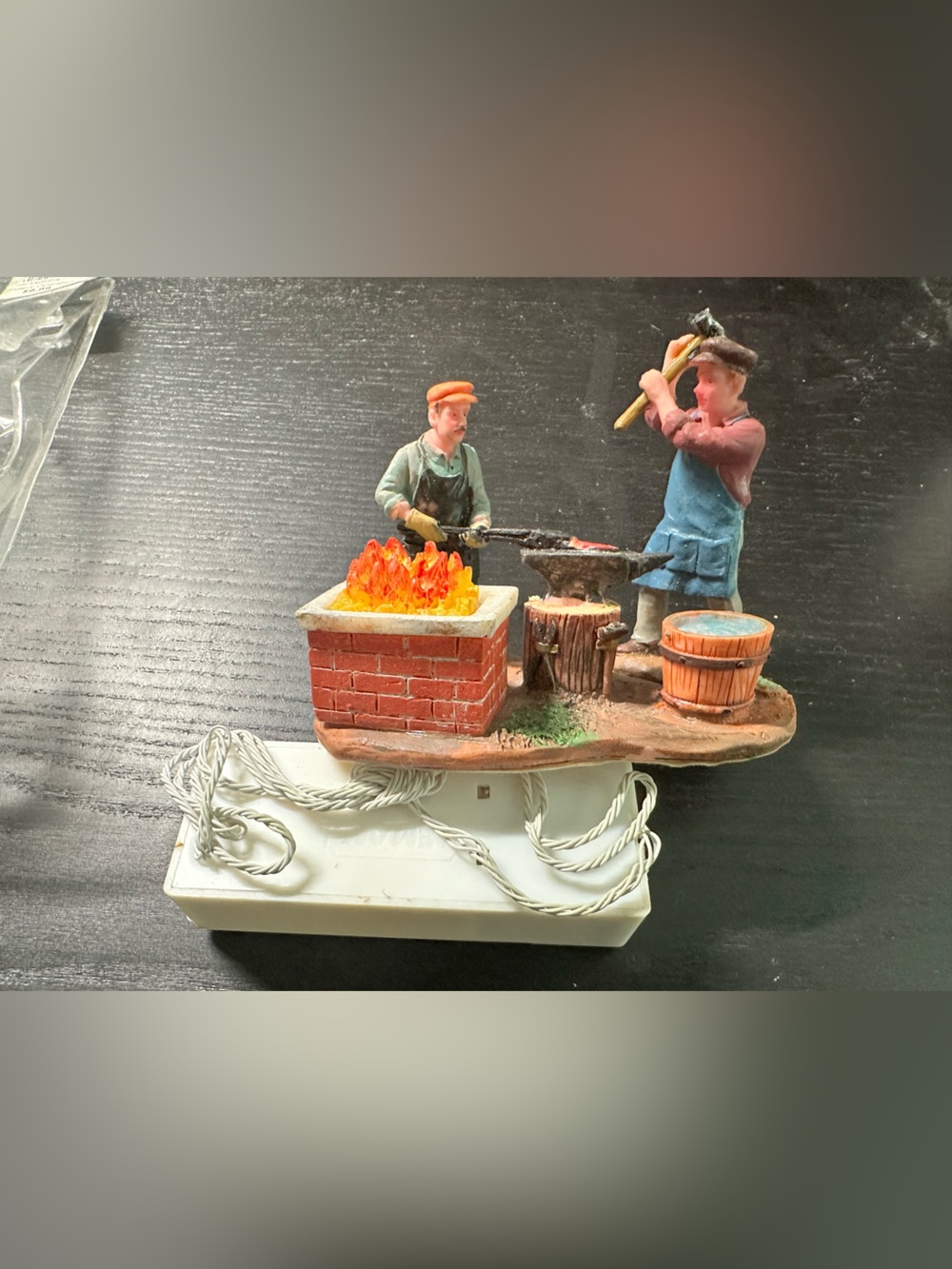 Lemax Blacksmith Workshop Figurine with Red Brick Forge and Blue Apron
